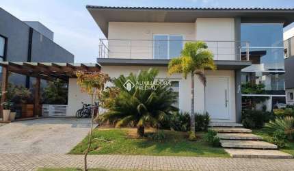 Casa em condomínio fechado com 3 quartos à venda na Rodovia Doutor Antônio Luiz Moura Gonzaga, 3825, Rio Tavares, Florianópolis, 310 m2 por R$ 6.360.000