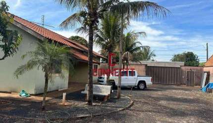 CASA DE 700m² DE TERRENO  3 QUARTOS 5 VAGAS DE GARAGEM NO BAIRRO  CANDIDO PORTINARI.