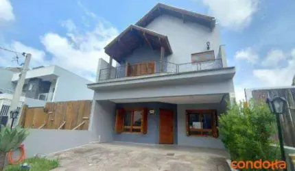 Sobrado com 3 dormitórios para alugar, 172 m² por R$ 4.779,39/mês - Hípica - Porto Alegre/RS