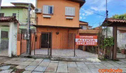 Casa com 3 dormitórios para alugar, 60 m² por R$ 1.440,00/mês - Vila Nova - Porto Alegre/RS