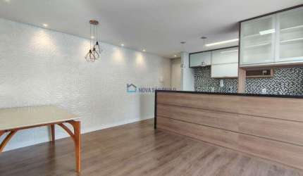 Apartamento com 2 quartos sala ampliada, 1 suíte e 1 vaga