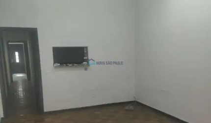 Casa Térrea à venda no Campo Belo com 3 quartos e 9 vagas de garagem.