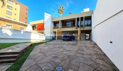 Casa 5 dormitórios à venda no Bairro Menino Deus com 455 m² de área privativa - 6 vagas de garagem