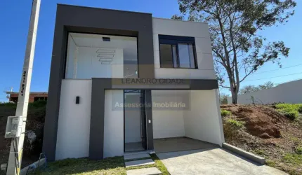 Casa de condomínio 2 dormitórios à venda no Bairro Vila Augusta com 126 m² de área privativa - 2 vagas de garagem
