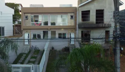 Casa de condomínio 3 dormitórios à venda no Bairro Mário Quintana com 110 m² de área privativa - 2 vagas de garagem