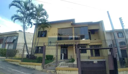 Casa 3 dormitórios à venda no Bairro Teresópolis com 283 m² de área privativa - 3 vagas de garagem