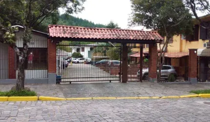 Casa de condomínio 3 dormitórios à venda no Bairro Morro Santana com 81 m² de área privativa - 2 vagas de garagem