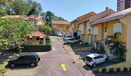 Casa de condomínio 3 dormitórios à venda no Bairro Morro Santana com 104 m² de área privativa - 2 vagas de garagem