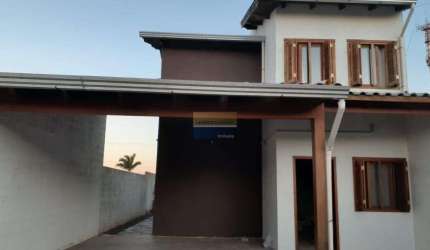 Casa de condomínio 3 dormitórios à venda no Bairro Centro com 145 m² de área privativa - 2 vagas de garagem