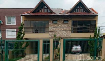 Casa com 3 quartos à venda na Rua Dom Jaime de Barros Câmara, 705, Sarandi, Porto Alegre, 235 m2 por R$ 799.000