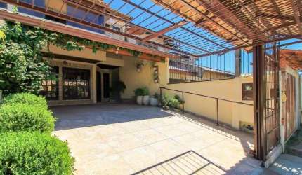 Casa com 3 quartos à venda na Rua Doutor Egydio Michaelsen, 62, Cavalhada, Porto Alegre, 198 m2 por R$ 680.000
