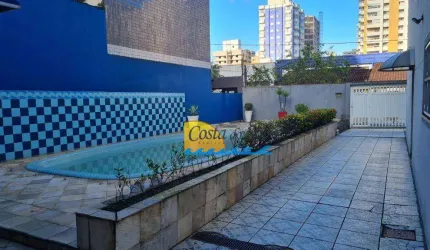 Sobrado com 4 dormitórios à venda, 200 m² por R$ 954.000,00 - Aviação - Praia Grande/SP