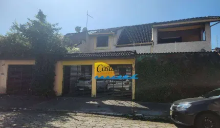 Sobrado com 4 dormitórios à venda, 211 m² por R$ 820.000,00 - Aviação - Praia Grande/SP