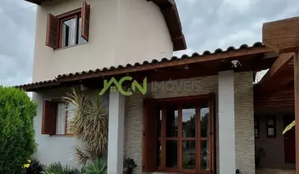 Casa com três dormitórios no bairro Sol Nascente