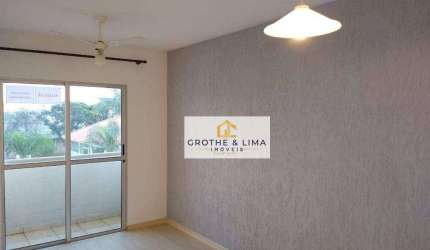 Apartamento com 2 dormitórios à venda, 57 m²