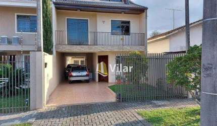 Sobrado com 4 dormitórios à venda, 220 m² por R$ 999.000 - Uberaba - Curitiba/PR