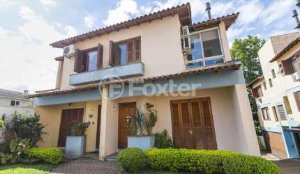 Casa em condomínio fechado com 3 quartos à venda na Rua Doutor Mário Totta, 416, Tristeza, Porto Alegre, 170 m2 por R$ 630.000