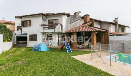 Casa com 5 quartos à venda na Rua Fortunato Della Casa, 35, Espírito Santo, Porto Alegre, 243 m2 por R$ 1.520.000