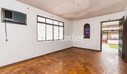 Casa com 3 quartos à venda na Rua Santa Flora, 1159, Nonoai, Porto Alegre, 240 m2 por R$ 807.000