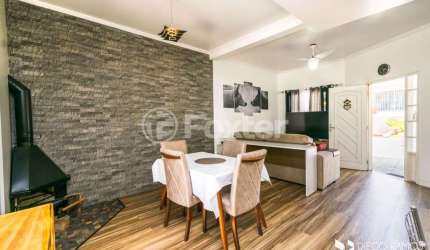 Casa em condomínio fechado com 3 quartos à venda na Rua Deputado Hugo Mardini, 1780, Passo das Pedras, Porto Alegre, 125 m2 por R$ 617.500
