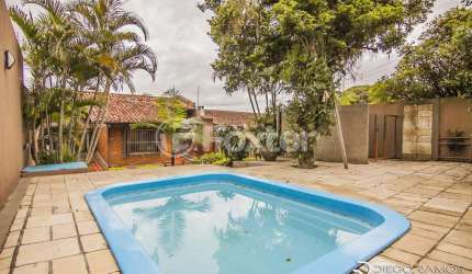 Casa com 3 quartos à venda na Rua Edgar Luiz Schneider, 490, Ipanema, Porto Alegre, 478 m2 por R$ 1.225.500