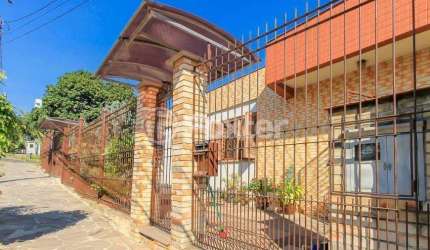 Casa com 5 quartos à venda na Rua Umbú, 566, Passo da Areia, Porto Alegre, 192 m2 por R$ 1.500.000