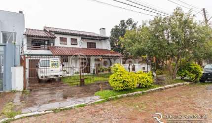 Casa com 4 quartos à venda na Rua Waldomiro Schapke, 311, Partenon, Porto Alegre, 260 m2 por R$ 890.000