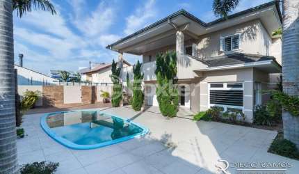 Casa com 4 quartos à venda na Rua Lagoa do Peixe, 170, Sarandi, Porto Alegre, 384 m2 por R$ 2.490.000