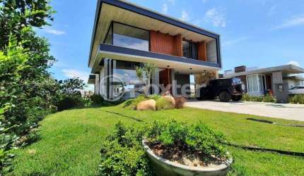 Casa em condomínio fechado com 4 quartos à venda na Rua Rio Divisa, 750, Centro, Xangri-Lá, 267 m2 por R$ 3.950.000