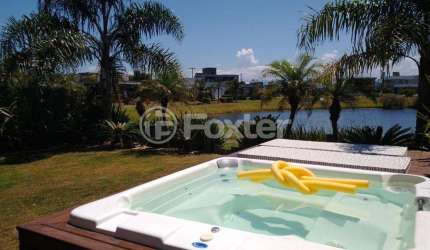 Casa em condomínio fechado com 3 quartos à venda na Rua Rio Divisa, 750, Centro, Xangri-Lá, 267 m2 por R$ 2.223.000