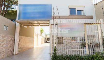 Casa com 3 quartos à venda na Rua Serro Azul, 1100, Santa Maria Goretti, Porto Alegre, 243 m2 por R$ 1.180.000