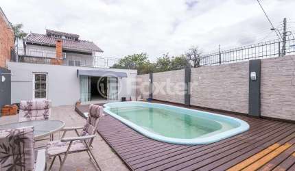 Casa com 4 quartos à venda na Rua Gregório da Fonseca, 331, Nonoai, Porto Alegre, 238 m2 por R$ 790.000