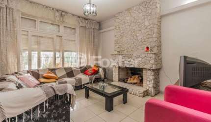 Casa com 4 quartos à venda na Rua Dom Jaime de Barros Câmara, 194, Jardim Itu Sabará, Porto Alegre, 223 m2 por R$ 557.000
