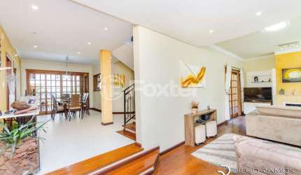 Casa com 4 quartos à venda na Rua Abdo Jorge Curi, 225, Parque Santa Fé, Porto Alegre, 243 m2 por R$ 780.000