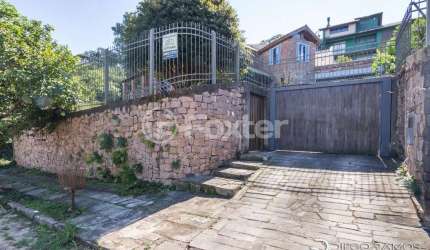 Casa com 4 quartos à venda na Rua Dona Lida Monteiro, 410, Teresópolis, Porto Alegre, 280 m2 por R$ 1.200.000