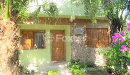Casa com 4 quartos à venda na Rua Doutor Carlos de Moura e Cunha, 172, Centro, Guaíba, 190 m2 por R$ 780.000