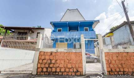 Casa com 8 quartos à venda na Rua Octávio de Souza, 995, Nonoai, Porto Alegre, 279 m2 por R$ 510.000