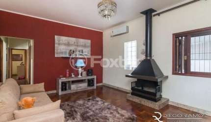 Casa com 6 quartos à venda na Rua Júlio Lopes dos Santos Sobrinho, 104, Santa Tereza, Porto Alegre, 145 m2 por R$ 735.000