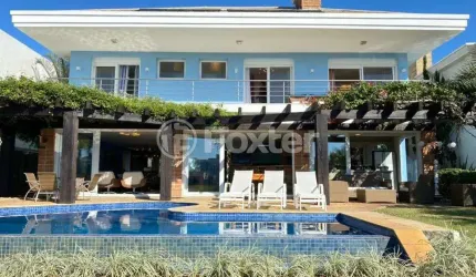 Casa em condomínio fechado com 5 quartos à venda na Avenida Central, 2500, Atlântida, Xangri-Lá, 400 m2 por R$ 4.560.000