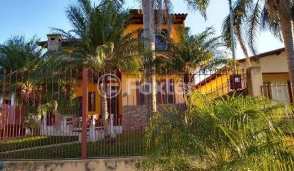 Casa com 4 quartos à venda na Rua Carazinho, 100, Cocão, Viamão, 134 m2 por R$ 500.000