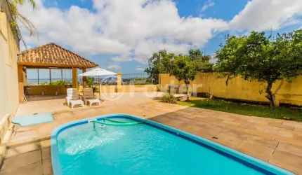 Casa com 4 quartos à venda na Rua Alcebíades Antônio dos Santos, 379, Nonoai, Porto Alegre, 375 m2 por R$ 1.805.000