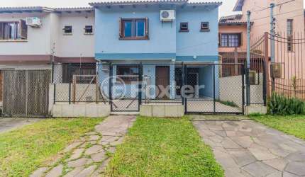 Casa com 3 quartos à venda na Rua Maria Elaine Wotter, 26, Parque Santa Fé, Porto Alegre, 135 m2 por R$ 415.000