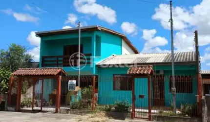 Casa com 3 quartos à venda na Rua Taimbé, 414, Sumaré, Alvorada, 205 m2 por R$ 400.000