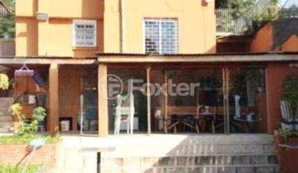 Casa com 3 quartos à venda na Rua Dom Pedrito, 432, Passo da Areia, Porto Alegre, 94 m2 por R$ 580.000