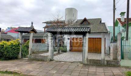 Casa com 4 quartos à venda na Rua Alfredo Silveira Dias, 36, Nonoai, Porto Alegre, 294 m2 por R$ 1.300.000