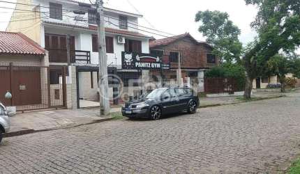 Casa com 3 quartos à venda na Rua Márcio Dias, 360, Nonoai, Porto Alegre, 370 m2 por R$ 900.000