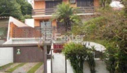 Casa com 3 quartos à venda na Avenida Fábio Araújo Santos, 1650, Nonoai, Porto Alegre, 279 m2 por R$ 957.500