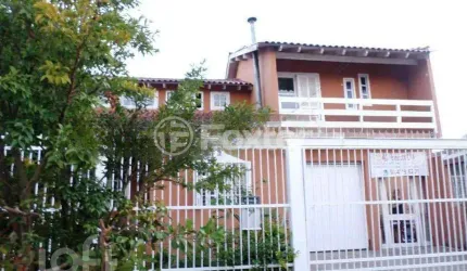 Casa com 4 quartos à venda na Rua Arroio Grande, 283, Cavalhada, Porto Alegre, 154 m2 por R$ 450.000