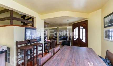 Casa com 3 quartos à venda na Rua Doutor Ney Cabral, 427, Nonoai, Porto Alegre, 282 m2 por R$ 930.000