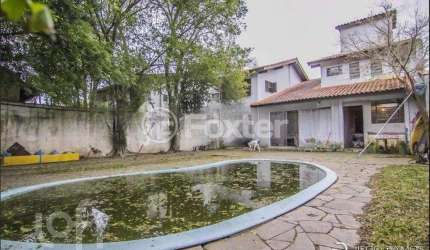 Casa com 4 quartos à venda na Rua Manoel Leão, 45, Pedra Redonda, Porto Alegre, 203 m2 por R$ 600.000